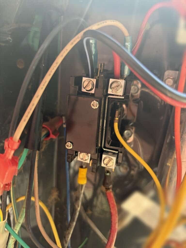 New contactor installed in the electrical compartment of a Fort Smith AC condenser