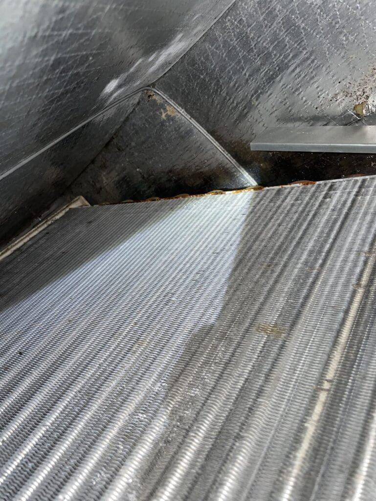 Indoor coil of a heat pump system in a Greenwood, Arkansas home