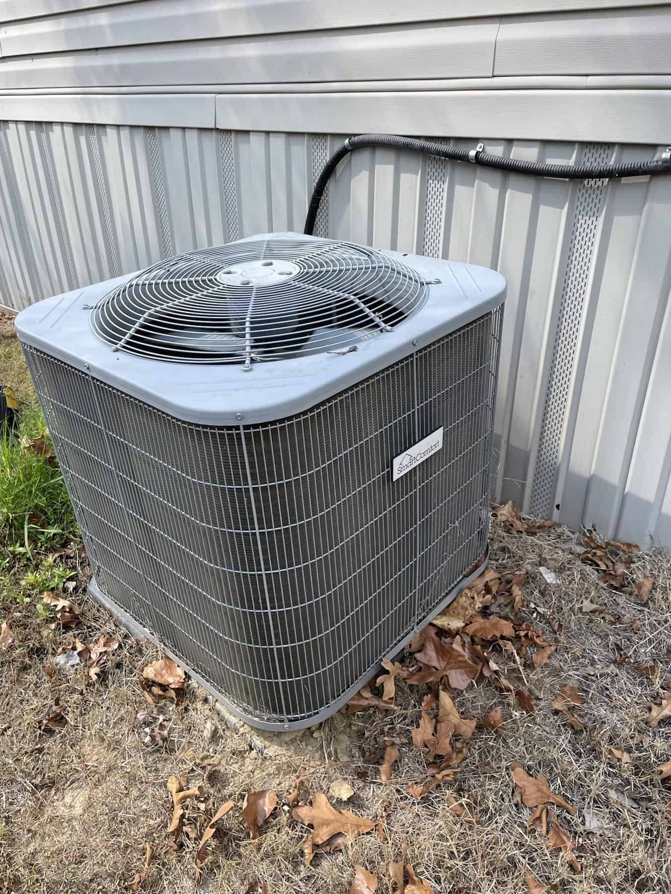 AC outdoor unit beside a home in Lavaca, Arkansas