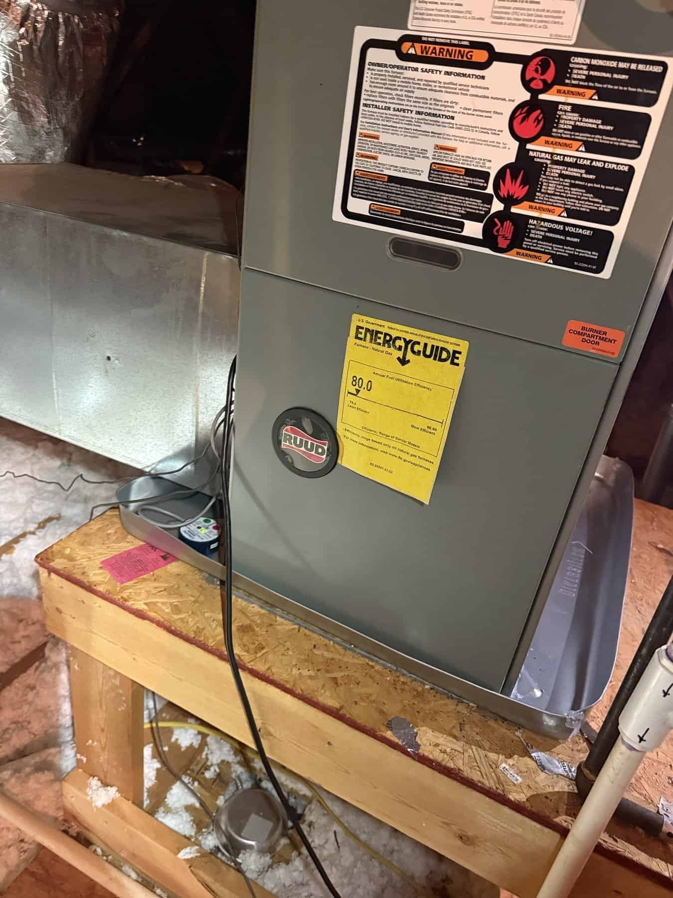 Riverside job photo showing an attic furnace and secondary drain pan in Fort Smith