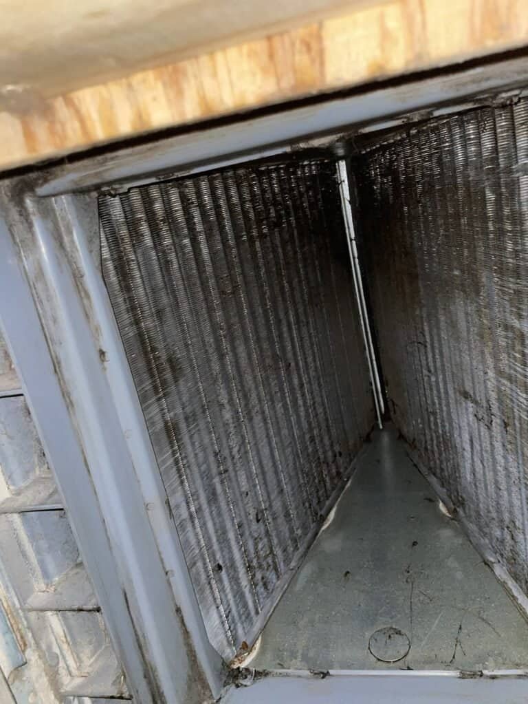 Indoor evaporator coil after a deep cleaning in a Van Buren home
