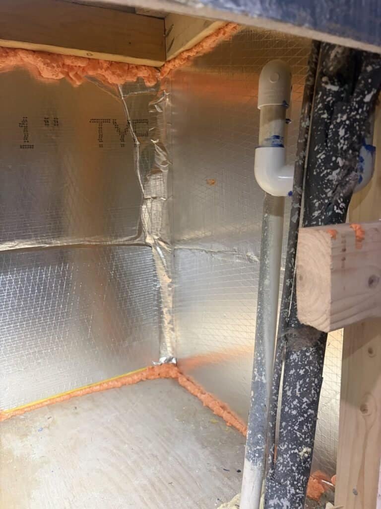 Return plenum lined with foil-faced duct board with sealed seams at a Van Buren home