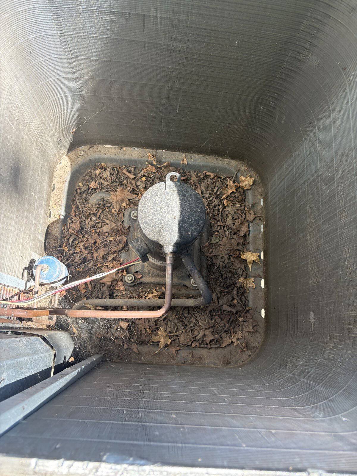 Leaves Packed Inside the Outdoor AC Unit in Barling, AR (AC Tune-Up)