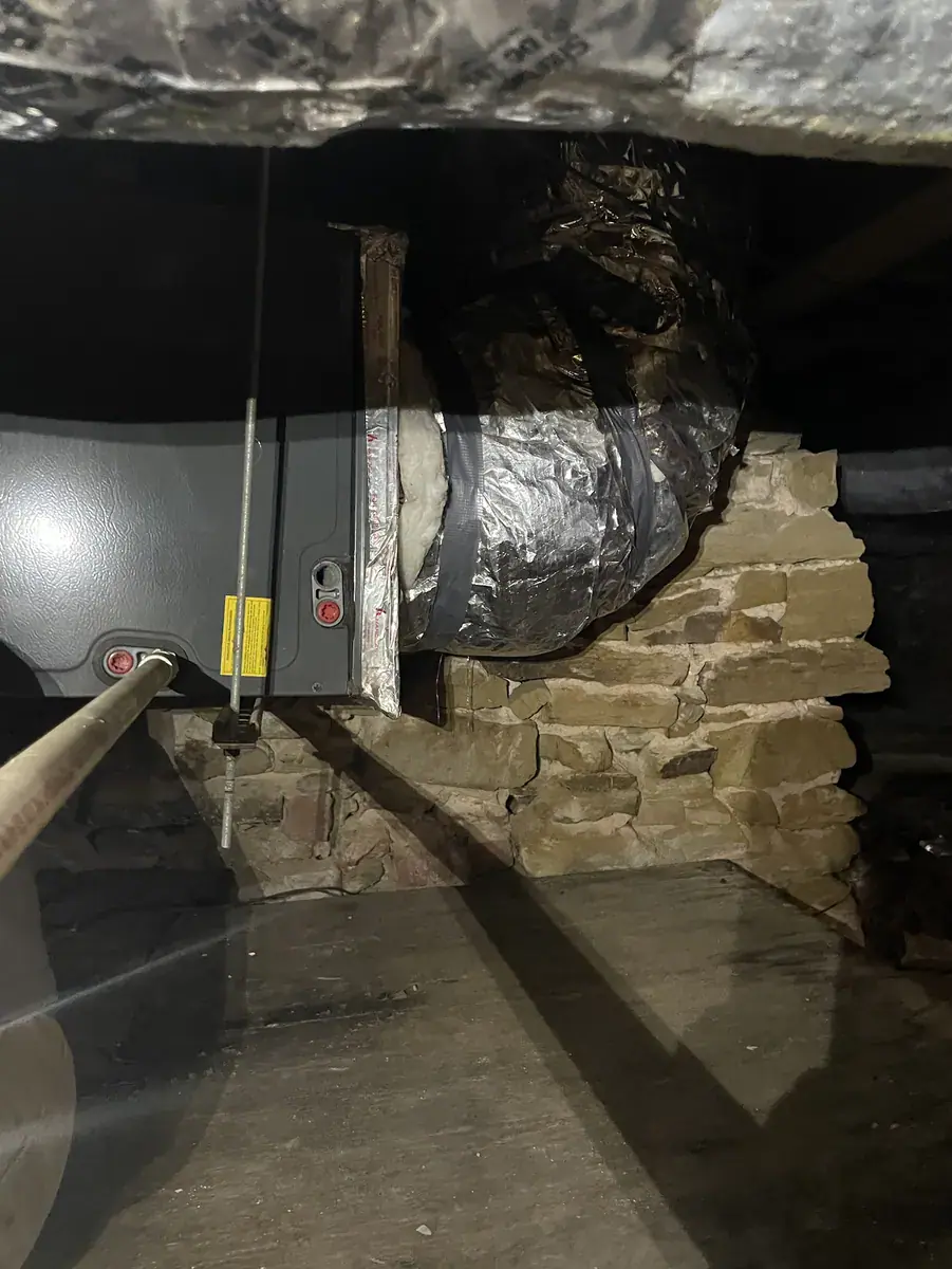 Gas furnace and ductwork in a Fort Smith crawlspace