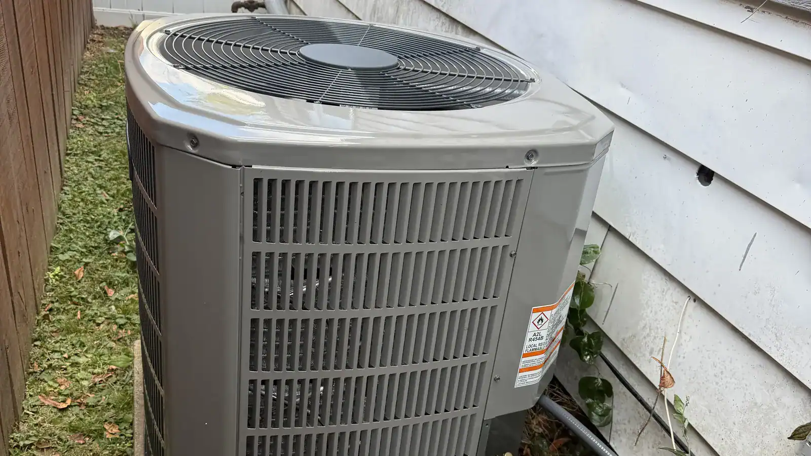 New outdoor AC unit installed beside a Fort Smith home