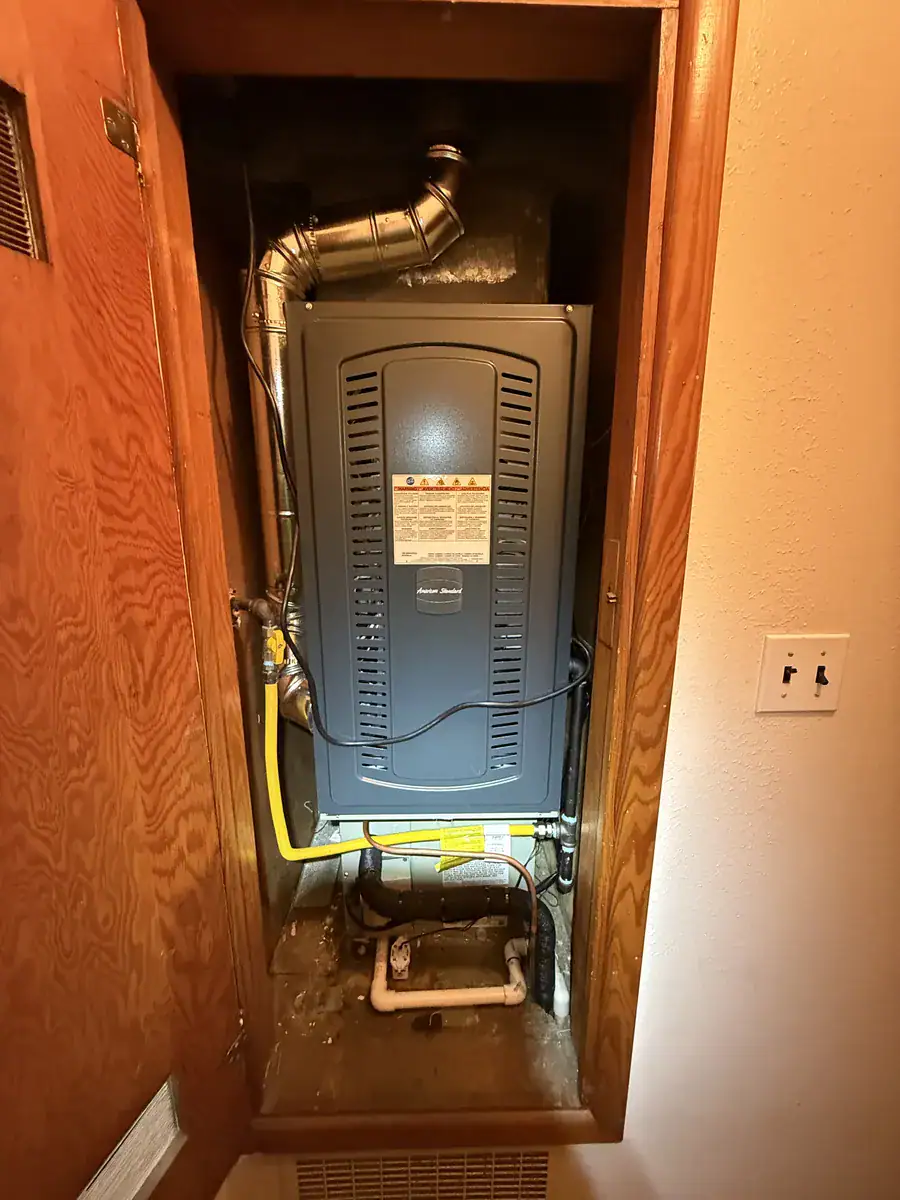 New gas furnace installed in a hall closet in a Fort Smith home