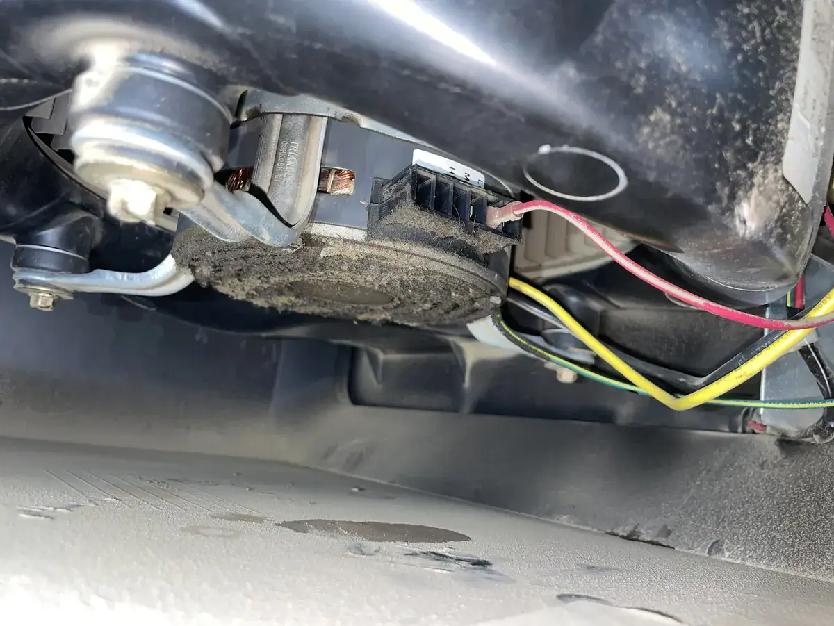 Fan motor inside a Greenwood furnace on a tune-up where the motor was replaced