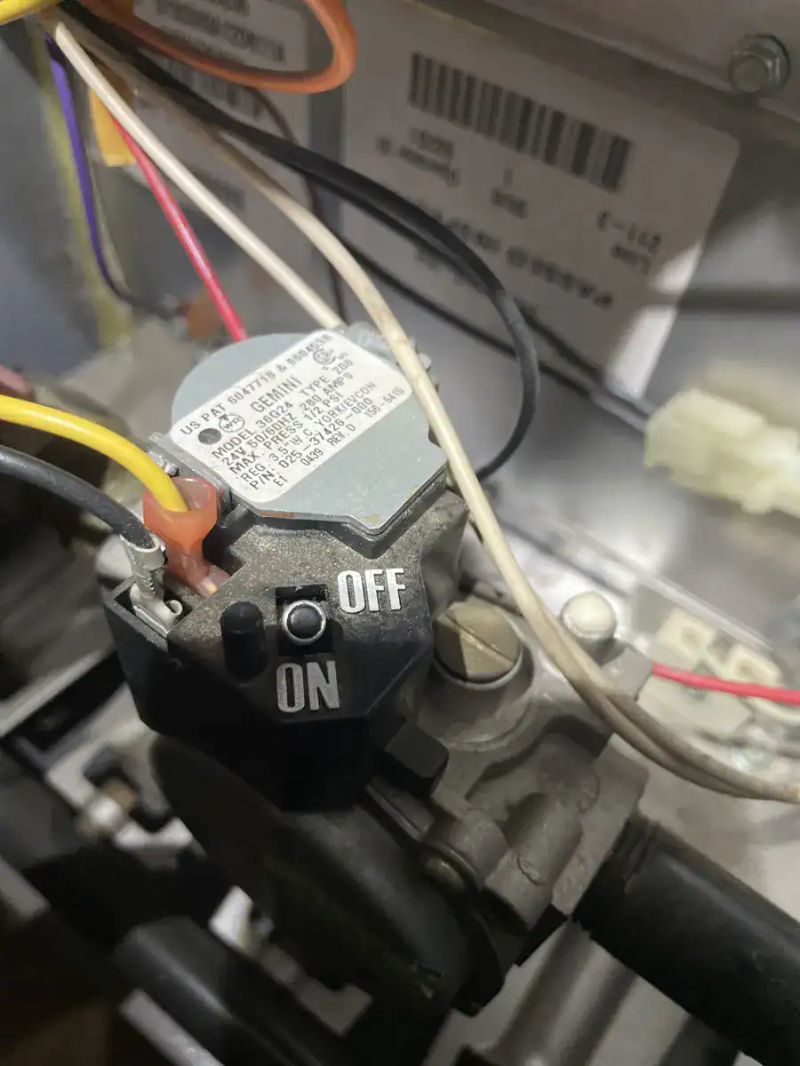 Gas valve (lets gas into the burners) on a Rheem furnace in a Greenwood home