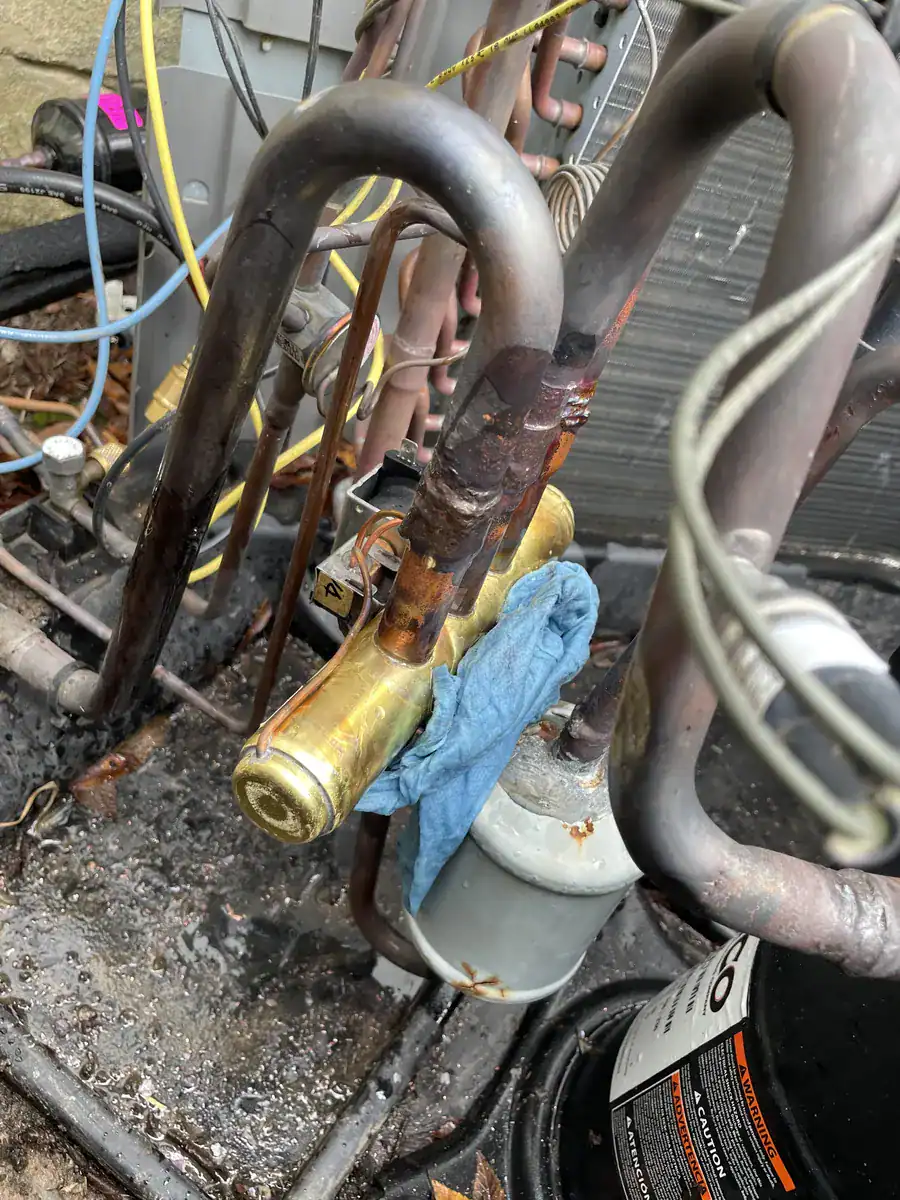 Copper piping and valves inside a Greenwood outdoor unit