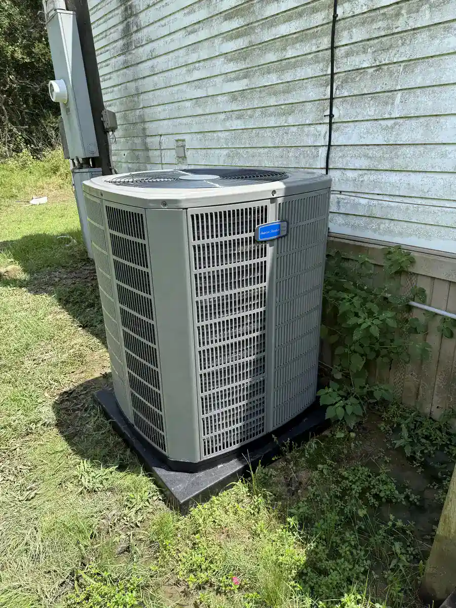 New outdoor unit after a Greenwood system replacement