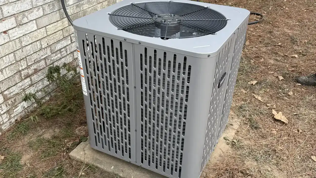 New heat pump outdoor unit installed beside a Van Buren home
